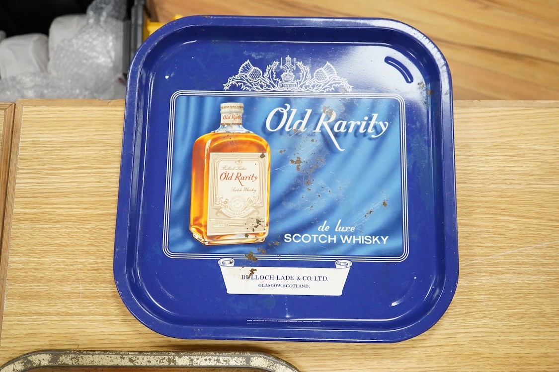 Five 1960s pub advertising trays for Scotch Whisky to include Johnnie Walker and Black & White, Buchanans, 35cm wide